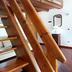 Della Biscia Lägenhetshotell